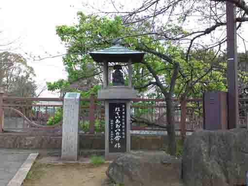 a statue of Hotei Aoi on Ebigawa