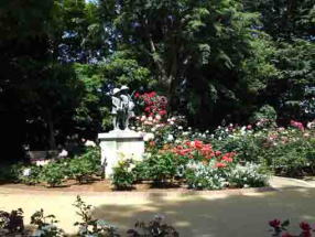 roses and a sculpture of children